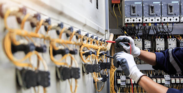 Professional Electrician technician working in Braddock Hills, PA